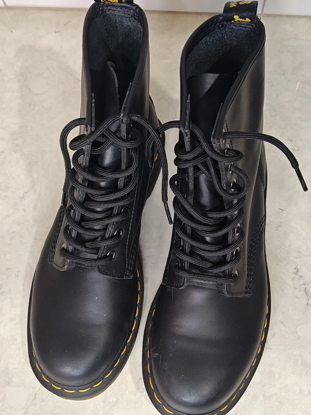 Dr. Martens Black Leather 8-Eye Lace-Up Boots with Yellow Welt Stitching